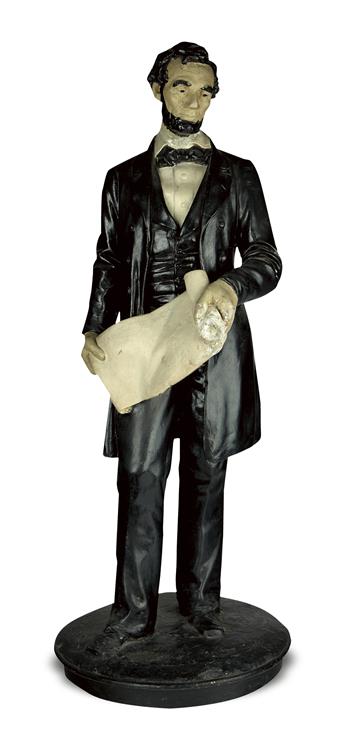 (SCULPTURE.) Full-figure statuette of Lincoln holding the Emancipation Proclamation, after Volk.